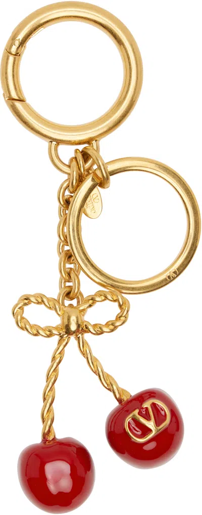 VALENTINO GARAVANI GOLD 'CHEZ VALENTINO' BAG CHARM KEYCHAIN
