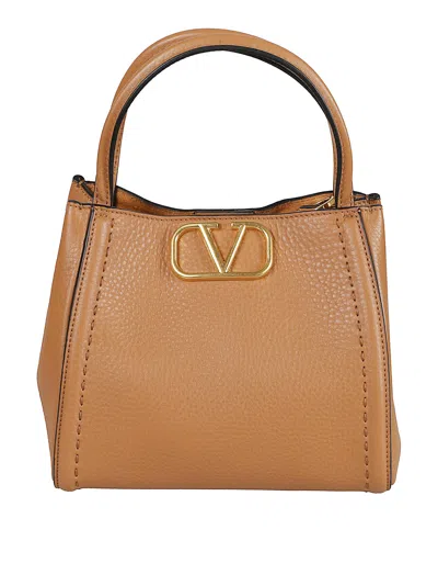 Valentino Garavani Grainy Calfskin Handbag In Brown