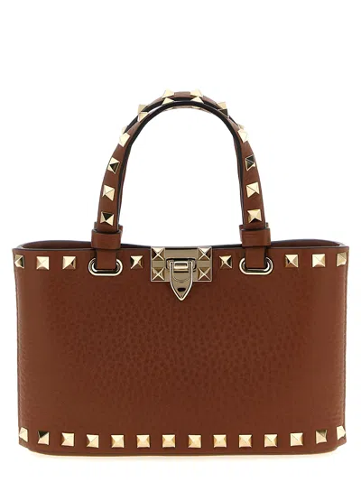 Valentino Garavani Valentino Gravani Rockstud Handbag In Brown