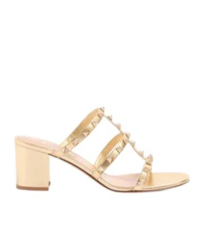 VALENTINO GARAVANI ROCKSTUD SLIDE SANDAL IN LAMINATED NAPPA LEATHER 60MM