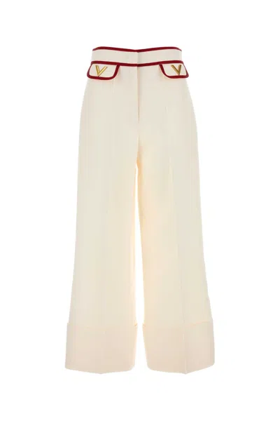Valentino Ivory Trousers With Gold V In Neutral