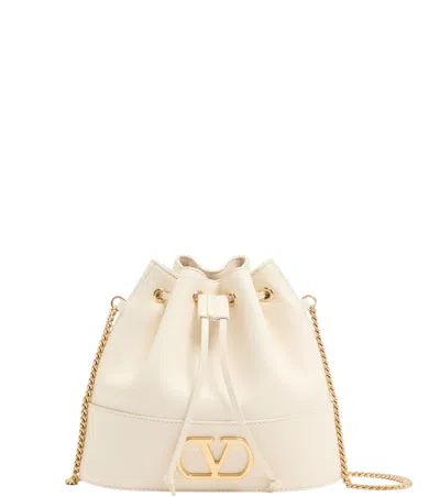 Valentino Garavani Ivory Vlogo Mini Bucket Bag In Neutral