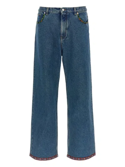 Valentino Trousers With Five Pockets And Floral Print Inserts In Blue