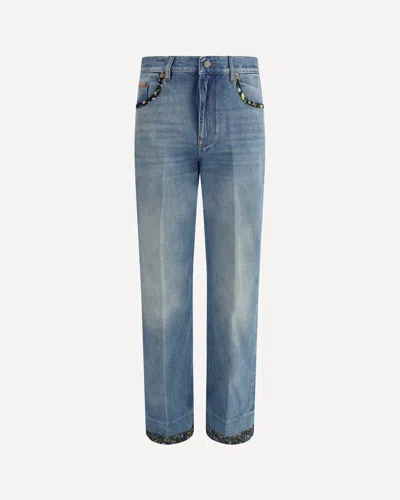 VALENTINO JEANS WITH FLORAL DETAILS