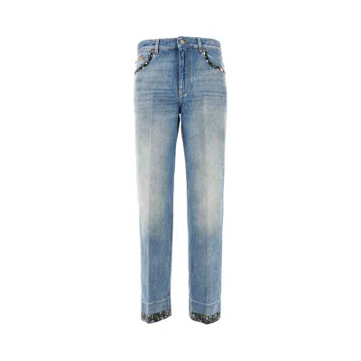 VALENTINO JEANS WITH FLORAL FABRIC TRIMMINGS