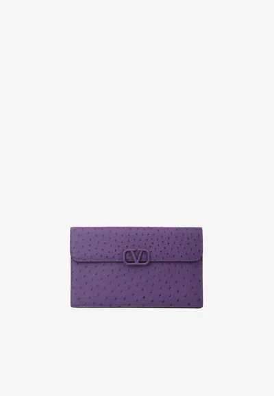 Valentino Garavani Large Vlogo Envelope Clutch In Ostrich Leather In Purple