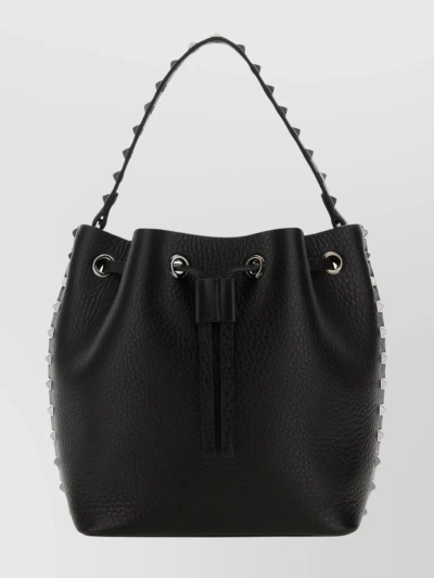 Valentino Garavani Leather Bucket Bag Featuring Rockstud Accents In Black