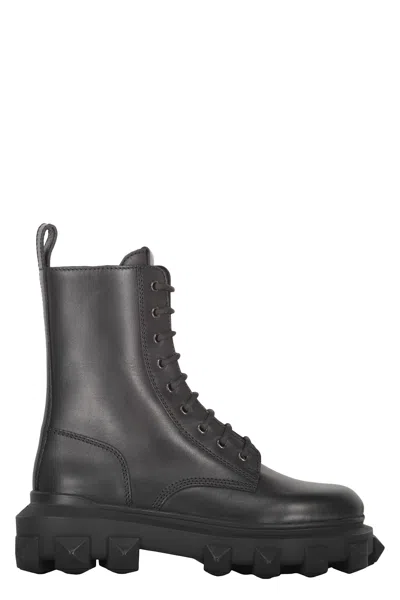 Valentino Garavani Leather Lace-up Boots In Black