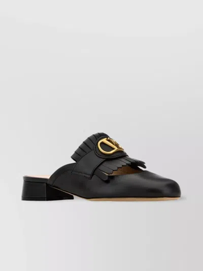 Valentino Garavani Leather Mules Vlogo Block Heel Buckle Fringed In Black