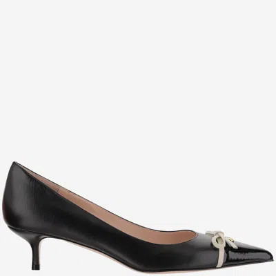 VALENTINO GARAVANI LEATHER PUMPS WITH BOW