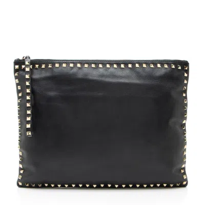 Valentino Garavani Leather Rockstud Oversized Clutch In Black