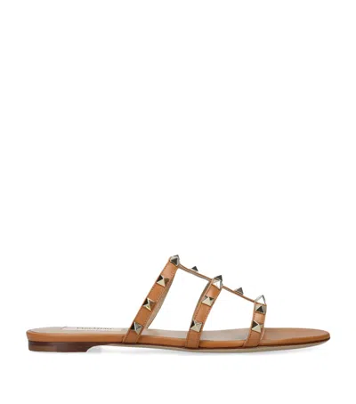 Valentino Garavani Leather Rockstud Sandals In Orange