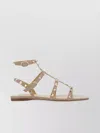 Valentino Garavani Rockstud Flat Calfskin Sandal With Straps Woman Poudre 41.5 In Pink