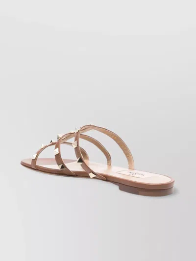 Valentino Garavani Leather Sandals With Studded Straps And Flat Sole In Brown