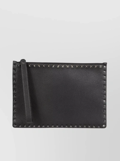 Valentino Garavani Leather Texture Studs Wrist Clutch In Black