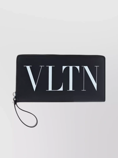 Valentino Garavani Leather Texture Wrist Strap Wallet In Black