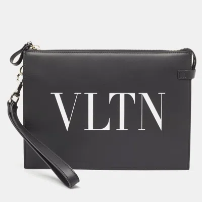 Valentino Garavani Leather Vltn Logo Wristlet Clutch In Black