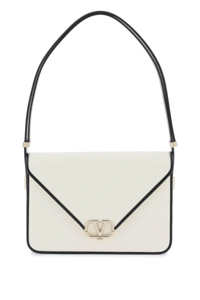 Valentino Garavani Letter Shoulder Bag In White,black