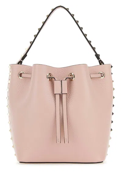 Valentino Garavani Leather Bucket Bag Featuring Rockstud Accents In Pink