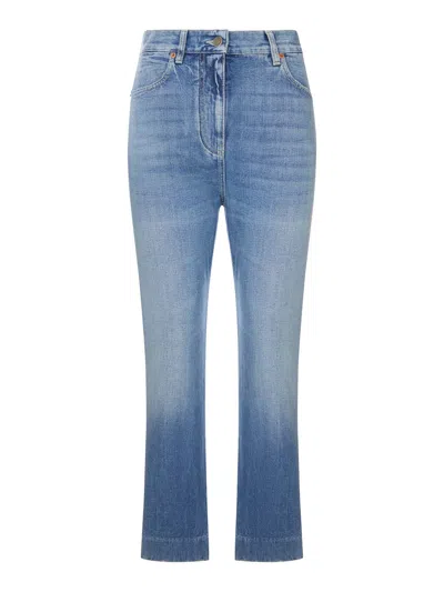 Valentino Light Wash Denim Flared Leg Cropped Jeans In Blue