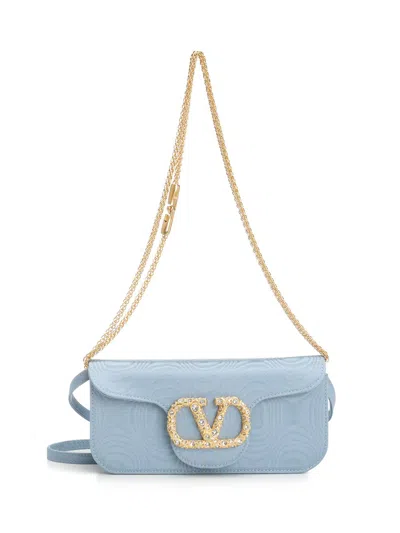 Valentino Garavani Locò Clutch In Light Blue