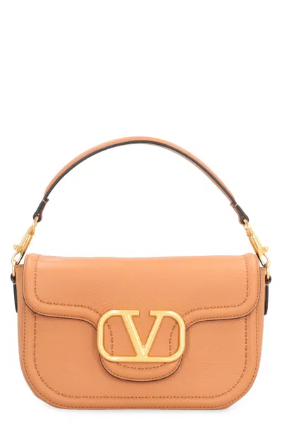 Valentino Garavani Locò Handbag In Saddle Brown
