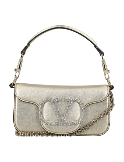 Valentino Garavani Metallic Leather Locò Small Handbag In Silver