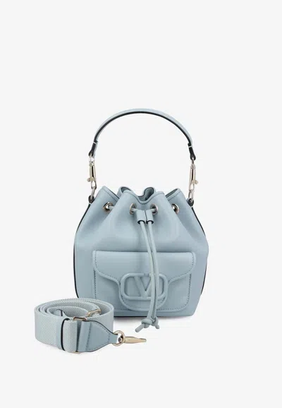 Valentino Garavani Locò Vlogo Bucket Bag In Calf Leather In Light Blue