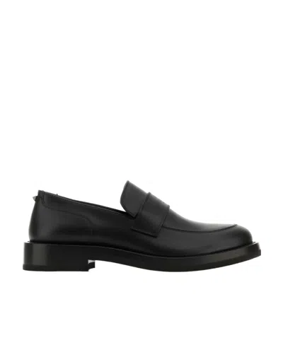 Valentino Garavani Logo-debossed Leather Loafers In Black