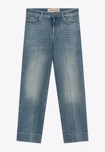 VALENTINO LOGO PATCH FADED JEANS