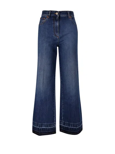 Valentino Logo Patch Wide Leg Jeans In Blue