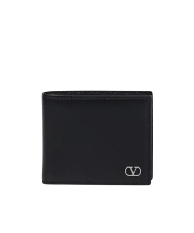 Valentino Garavani Textured Leather Wallet With Subtle Logo Detail In Black