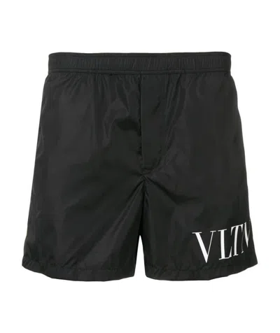Valentino Logo Printed Beach Shorts In Black