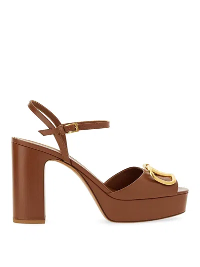 Valentino Garavani Sandals Featuring Front Strap Embellishment In Brown