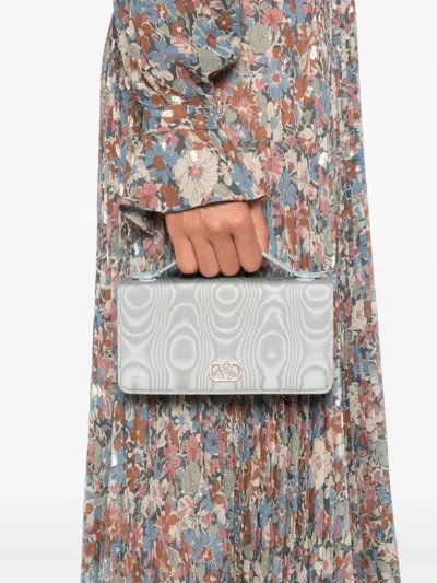 Valentino Garavani Logo-plaque Clutch Bag In Silver