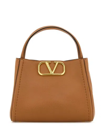 Valentino Garavani Medium Alltime Leather Top Handle Bag In Beige