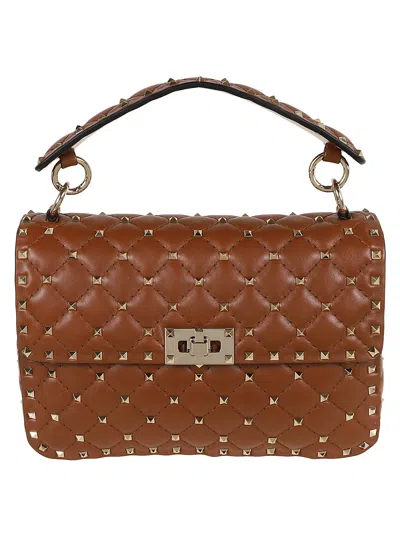 Valentino Garavani Medium Shoulder Bag Spike Rockstud In Tobacco