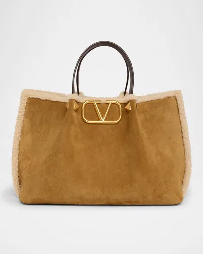 Valentino Garavani Medium Suede Shopping Bag With Shearling Lining In Brown