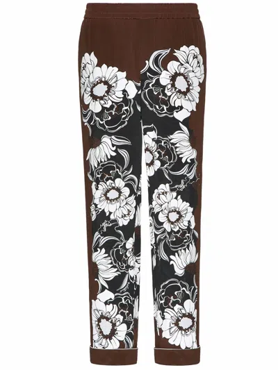 Valentino Men's Floral Print Silk Trousers For Ss22 In Black