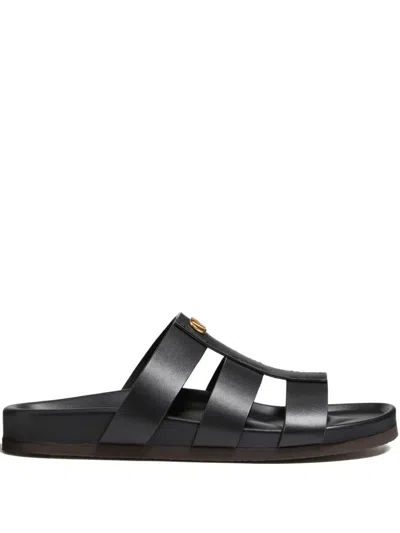 Valentino Garavani Studshield Logo-embellished Leather Sandals In Black