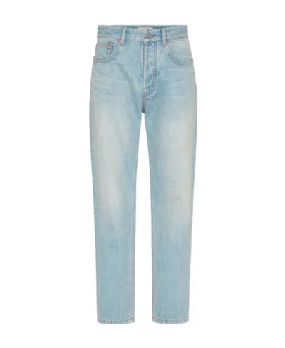 VALENTINO VALENTINO LOGO PATCH MID-RISE JEANS