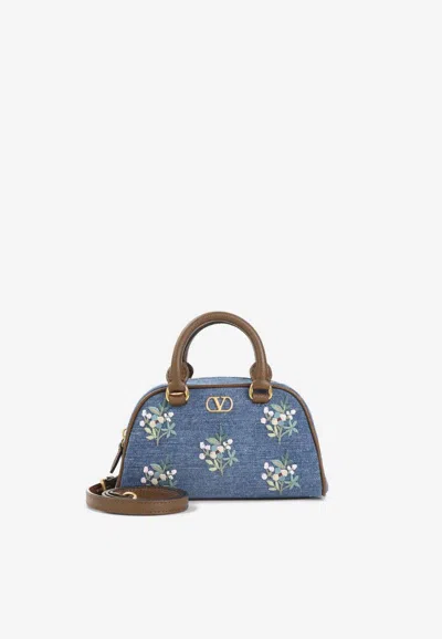 Valentino Garavani Mini Floral Embroidered Vlogo Denim Handbag In Purple