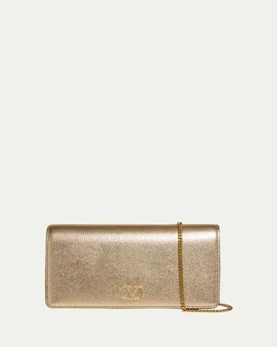 Valentino Garavani Mini Laminated Leather Crossbody Bag In Gold