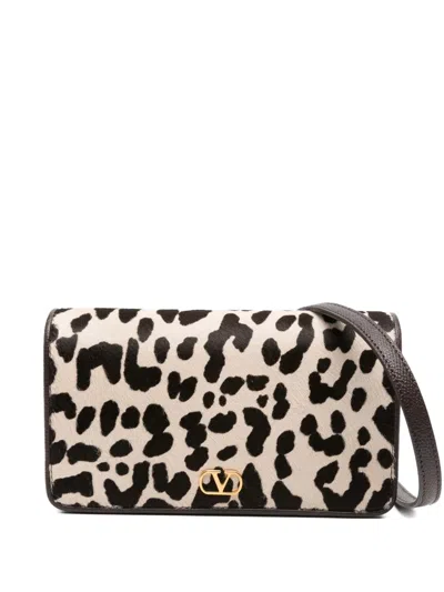 Valentino Garavani Mini Leather Clutch In Brown
