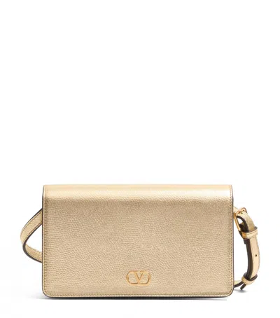 Valentino Garavani Mini Leather Vlogo Shoulder Bag In Gold