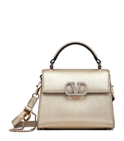 Valentino Garavani Vlogo Leather Shoulder Bag In Gold