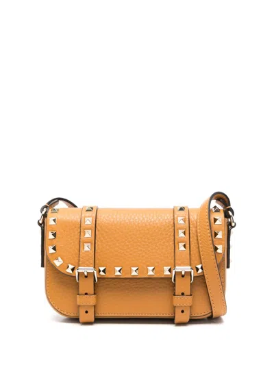 Valentino Garavani Mini Rockstud Cross Body Bag In Brown