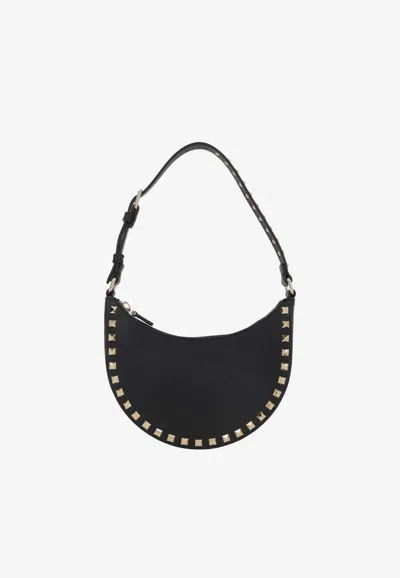 Valentino Garavani Mini Rockstud Grained Leather Hobo Bag In Black