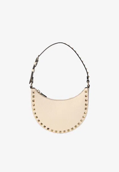 Valentino Garavani Mini Rockstud Grained Leather Hobo Bag In Ivory