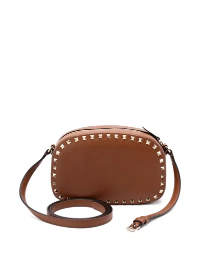 Valentino Garavani Mini Rockstud Leather Cross Body Bag In Brown